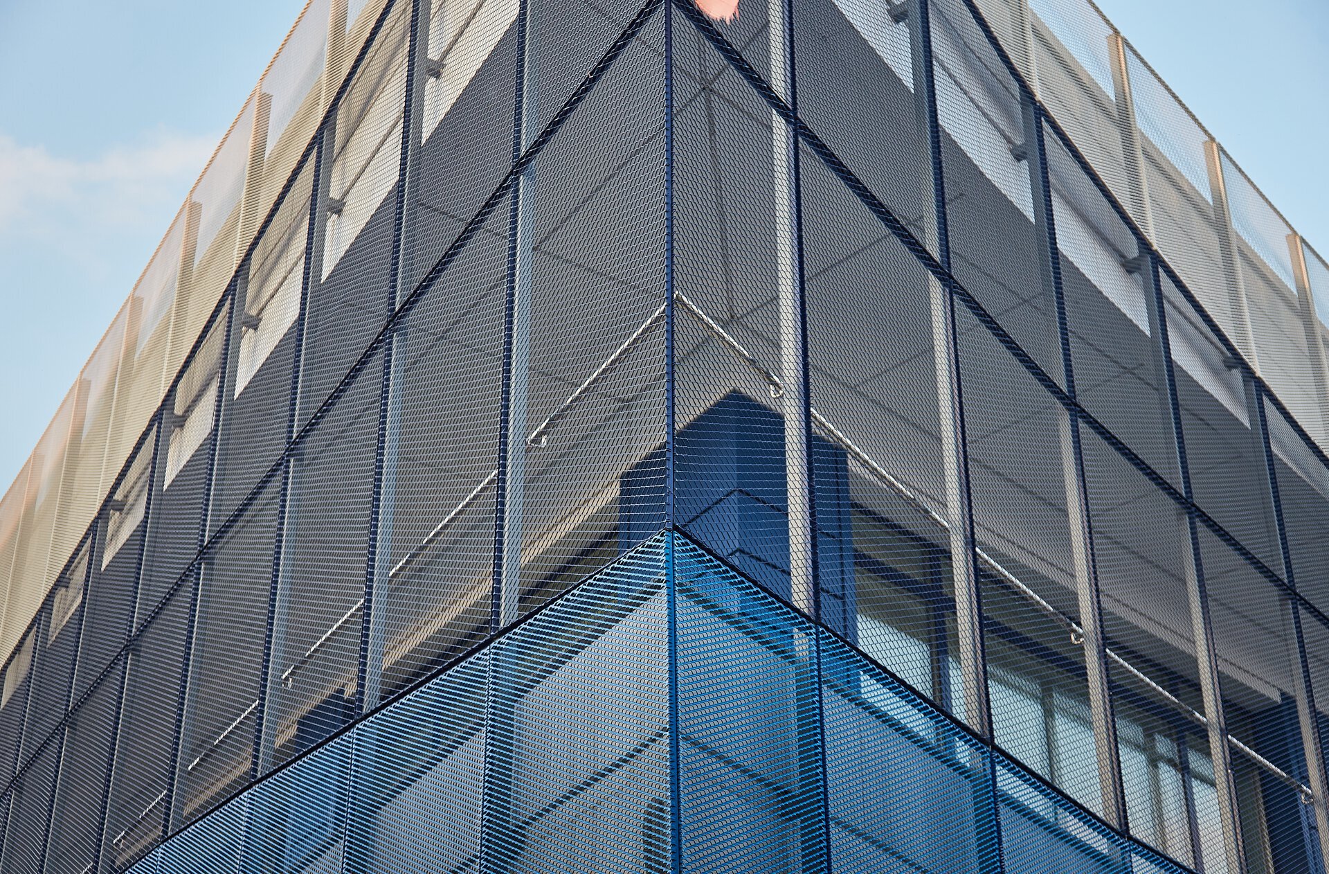 Perforated-sheet envelope detail of the office building of the FAN Courier Brașov hub, project PPAE
